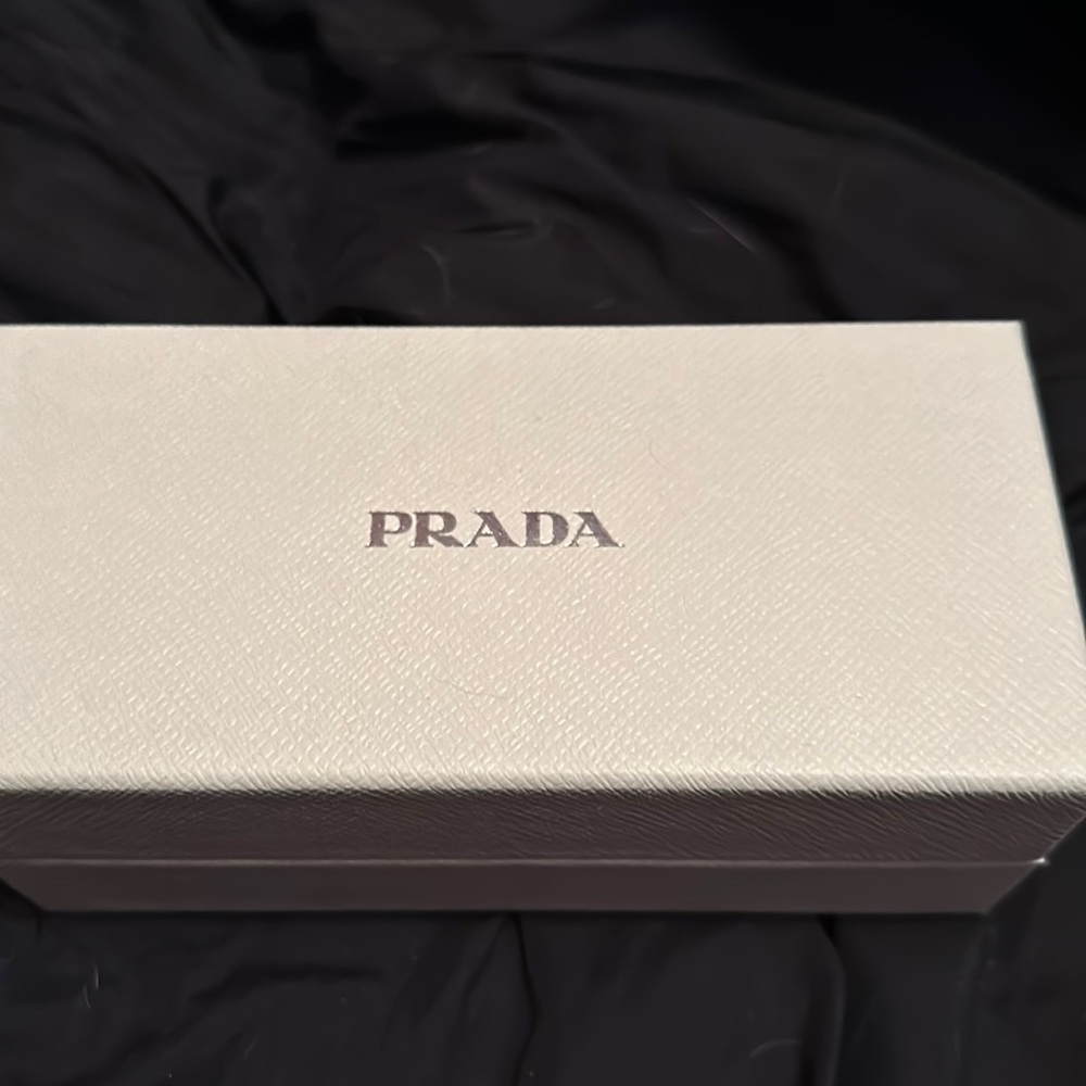 Never been worn Prada sunglasses.